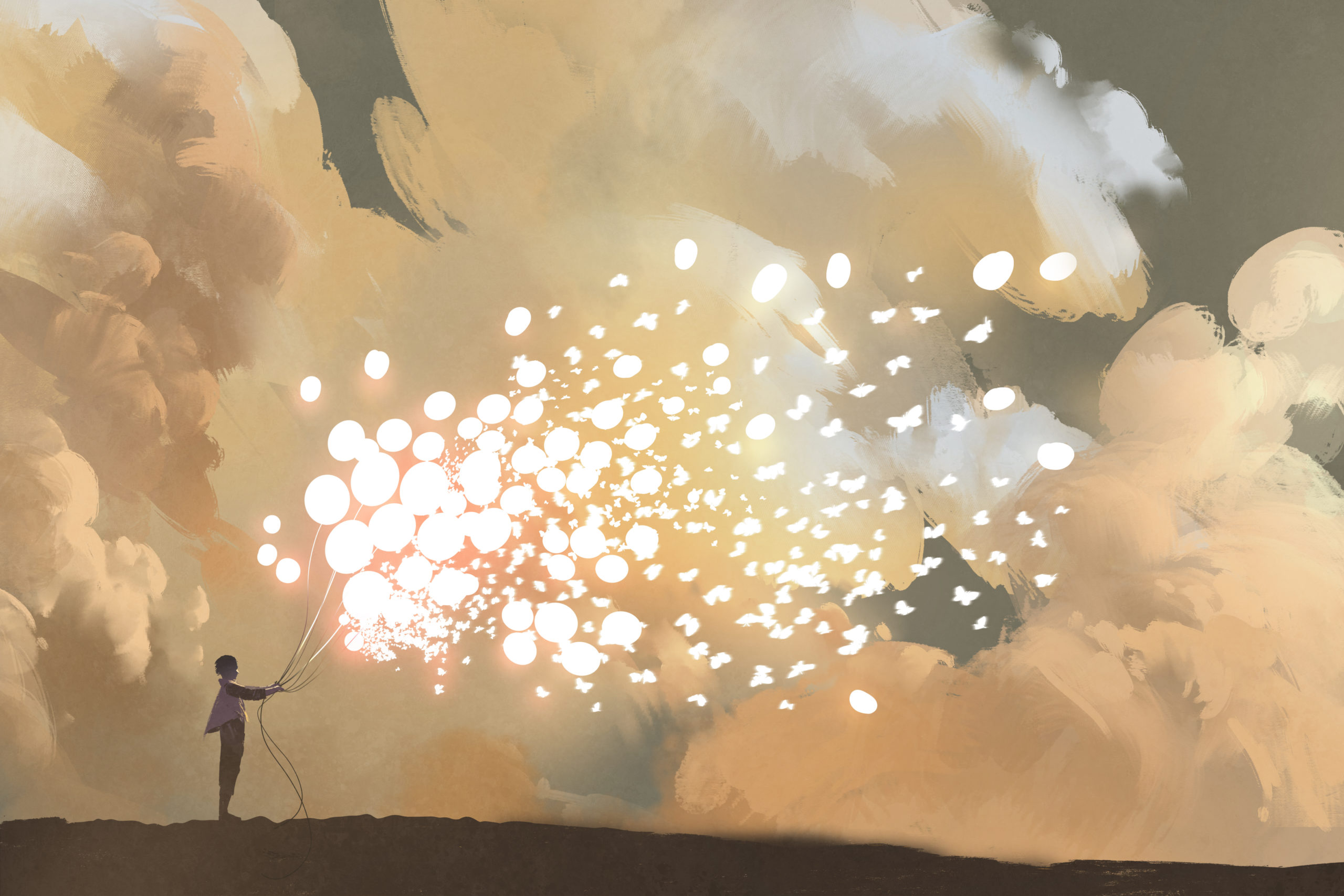 man releasing glowing balloons and butterflies flock