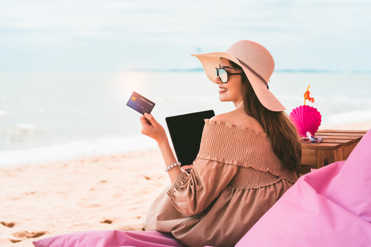 Asian smile woman relax at beach on summer vacation.