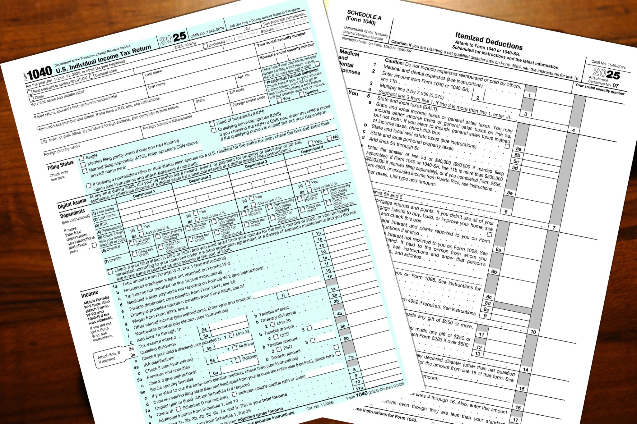 2025 IRS 1040 tax form and schedule A on a desktop.
