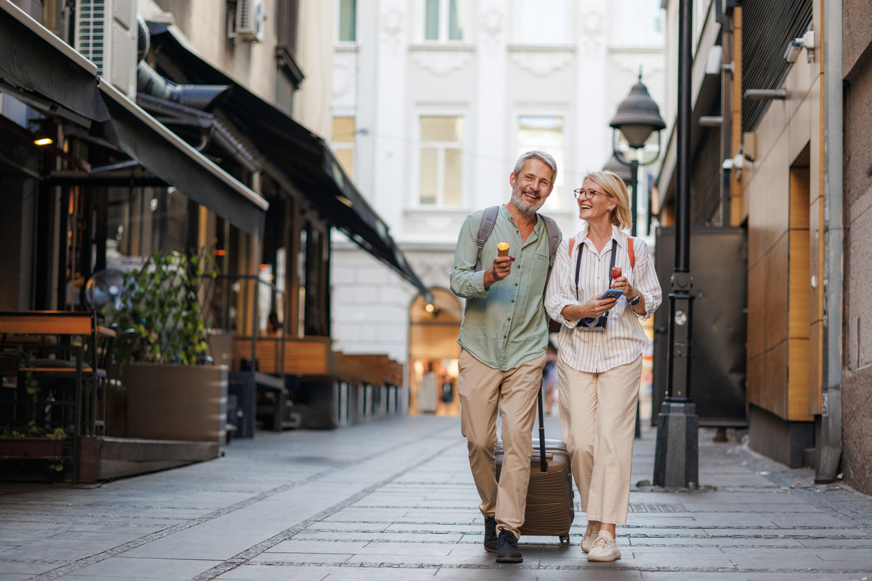 Happy mature couple exploring a charming European city together